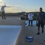 roofers in tucson doing a roof inspection, a roof maintenance service for tucson's rainy season